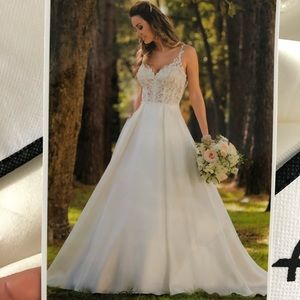Brand new Stella York, size 12 wedding dress, tags still on.